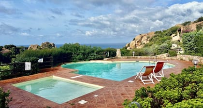 On the stretch of coast between Santa Teresa di Gallura and Isola Rossa, in the north of Sardinia, lies the Costa Paradiso residential complex. The resort of Costa Paradiso is an oasis of tranquillity overlooking an <b>unspoilt natural landscape</b> and