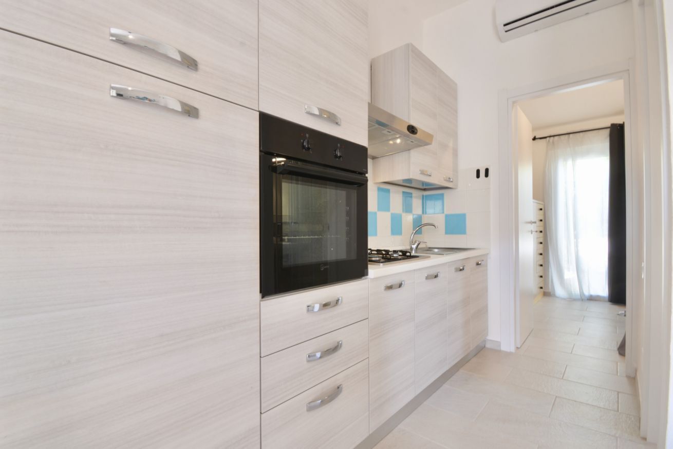 Frigorifero, forno, piano cottura, tostapane