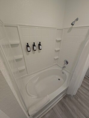 Hair dryer, towels, soap, toilet paper
