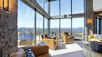 Smart TV, fireplace, books, stereo