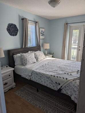 1 bedroom, desk, iron/ironing board, travel crib