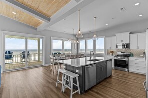 Fridge, microwave, oven, stovetop - 6BR Oceanfront Sanctuary: Pool, Elevator, Near Pier & More (Oak Island)