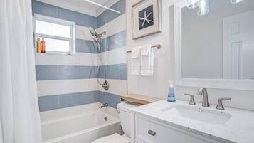 Hair dryer, towels, soap, toilet paper