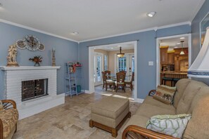 Smart TV, fireplace, books