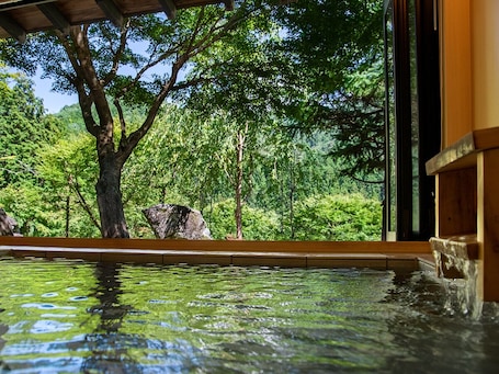 Suite, Garden View | Bathroom | Slippers
