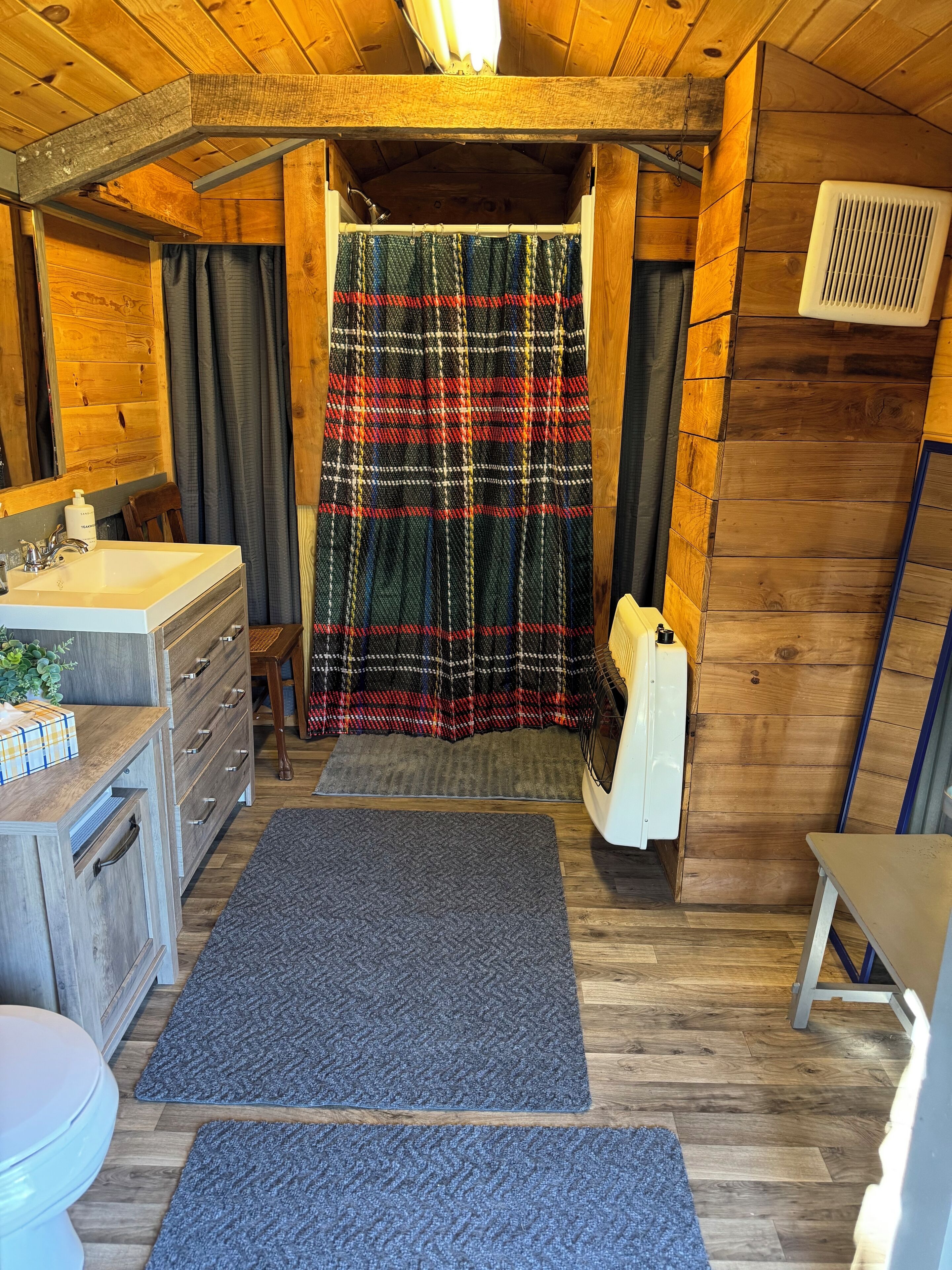 Shower, towels, soap, toilet paper