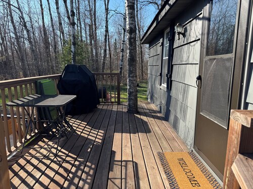 Charming cabin in delightful Duquette with AC near miles of ATV trails.