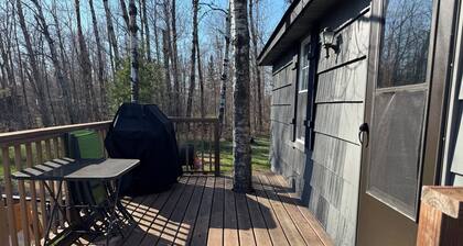 Charming cabin in delightful Duquette with AC near miles of ATV trails.