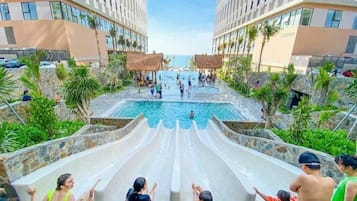 Relax by the pool surrounded by lush surroundings and enjoy thrilling water slides.