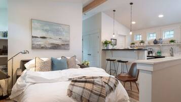 1 bedroom, desk, iron/ironing board, travel crib