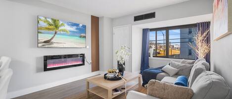 Smart TV, fireplace, books