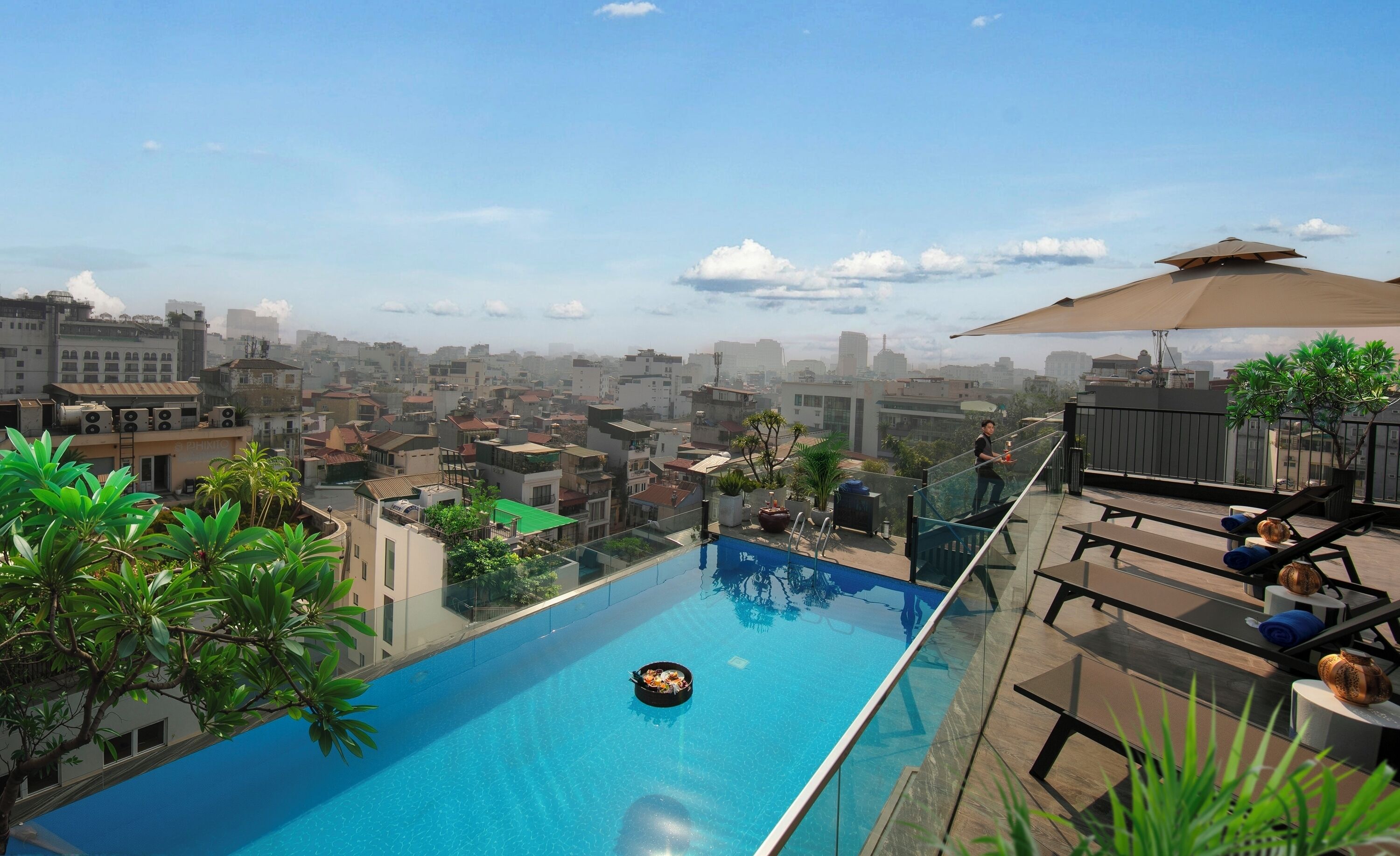 Outdoor pool, open 6:00 AM to 5:00 PM, pool umbrellas, pool loungers