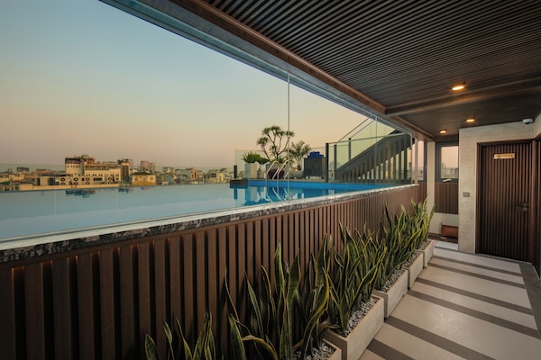 Outdoor pool, open 6:00 AM to 5:00 PM, pool umbrellas, sun loungers