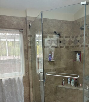 Shower, hair dryer, towels, soap