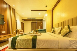 In-room safe, desk, laptop workspace, blackout drapes - Hotel Vedangam Varanasi (Varanasi)