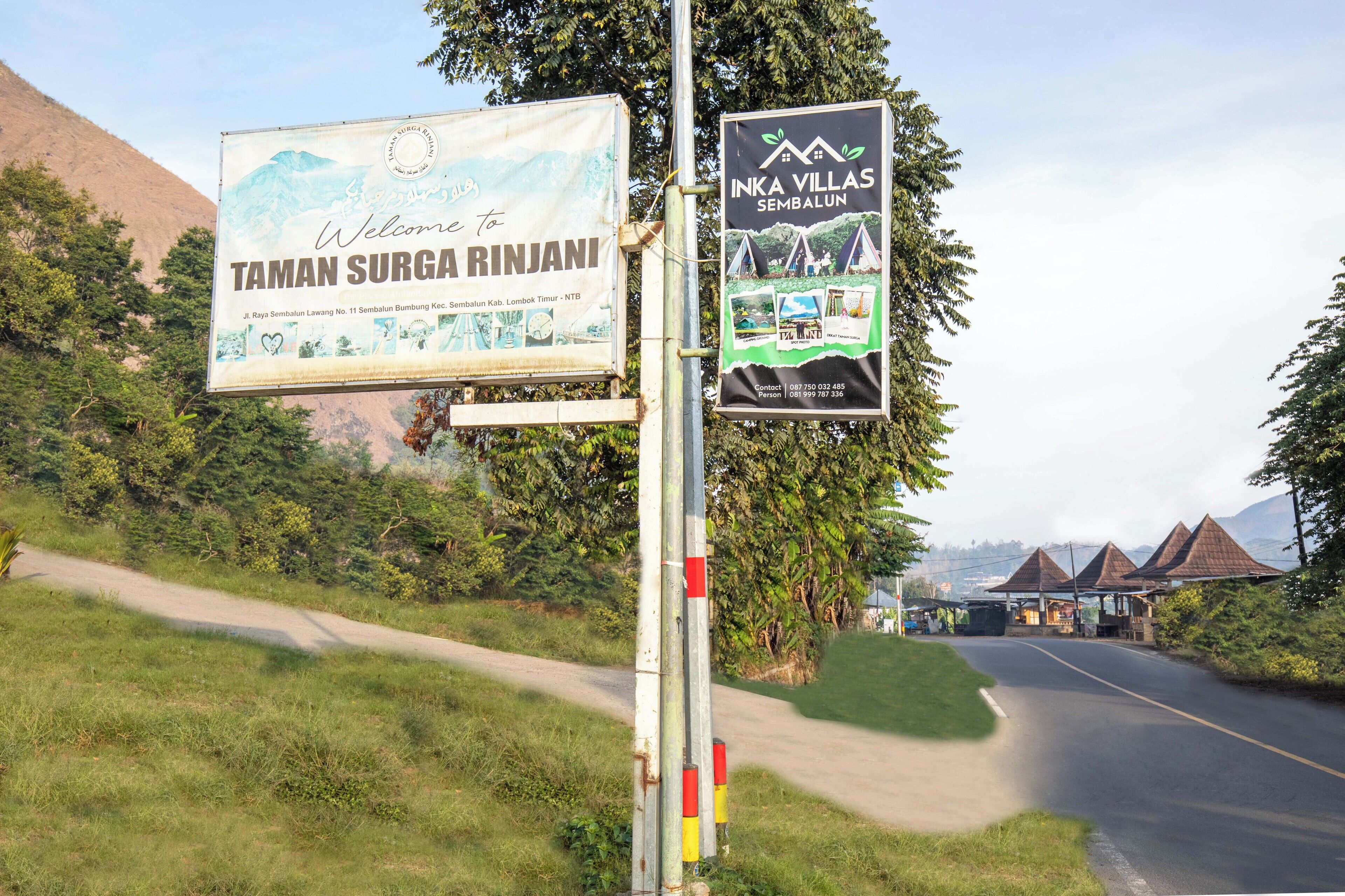 A welcome sign for Taman Surga Rinjani and a sign for Inka Villas Sembalun.
