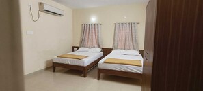 Family Quadruple Room | Desk, laptop workspace, soundproofing, free WiFi - The Grand Pratap (Dwarka)