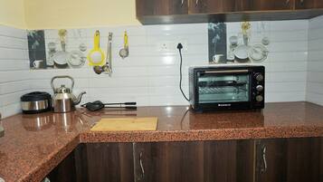 Fridge, stovetop, cookware/dishes/utensils