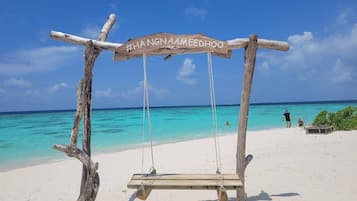 On the beach, white sand