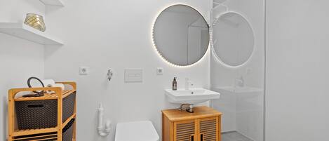 Hair dryer, towels, toilet paper