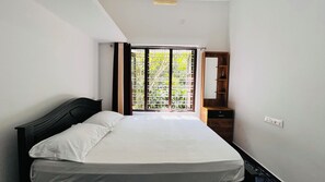 Chambre Deluxe | Espace de travail pour ordinateurs portables, accès au Wi-Fi (inclus)