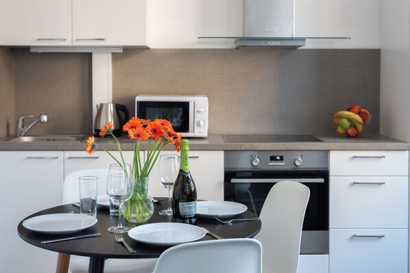 Comfort Apartment, City View | Private kitchen | Full-size fridge, microwave, oven, stovetop - Loft duplex studio in Prague Center (Prague)