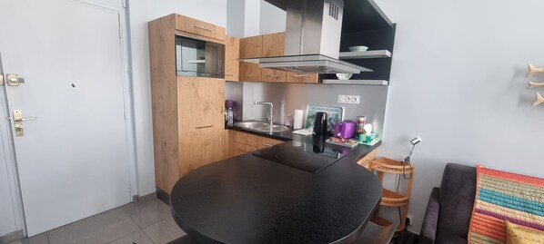 Fridge, microwave, dishwasher, coffee/tea maker