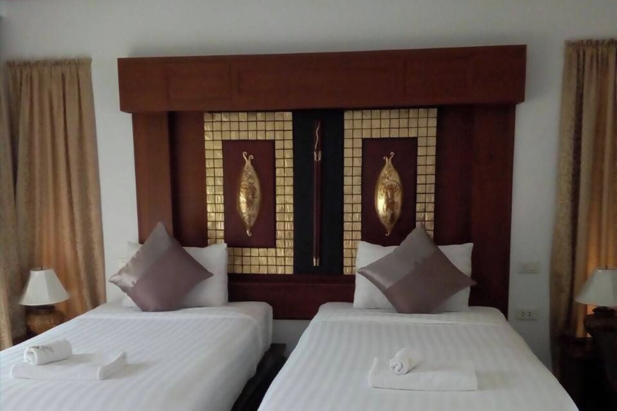Bungalow, 2 eenpersoonsbedden, uitzicht op resort | Verduisterende gordijnen, gratis wifi, beddengoed