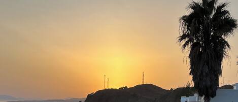 On the beach, sun loungers, beach towels