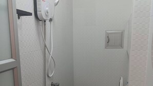 Deluxe Studio Suite, City View | Bathroom | Shower, hair dryer (on request), bidet, towels - The Character Yaowarat (Bangkok)