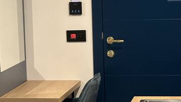 Deluxe Double Room, Courtyard View | Private kitchen | Mini-fridge, stovetop, electric kettle, cookware/dishes/utensils