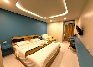 Premium bedding, down duvets, desk, laptop workspace