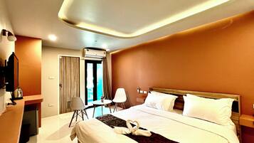 Premium bedding, down duvets, desk, laptop workspace