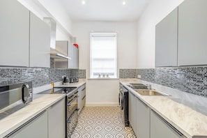 Fridge, microwave, oven, stovetop - Apartment 1, Eclectic boho oasis. (Boston)