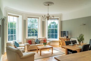 Lägenhet Superior - 2 sovrum - kök - utsikt mot trädgården | Vardagsrum