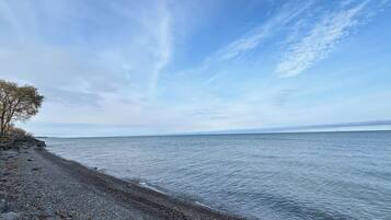 On the beach, sun loungers, beach towels