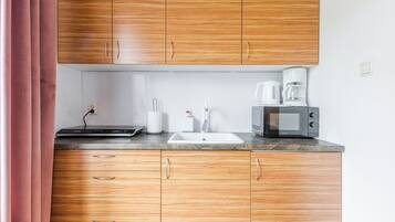 Standard Studio | Living area | Flat-screen TV