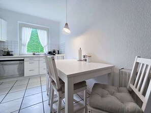 Dining - Alpha Apartments: Central 2BR, Living Room & Bath (Essen)