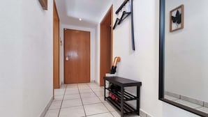 Unclassified image, 4 of 12, button - Alpha Apartments: Central 2BR, Living Room & Bath (Essen)