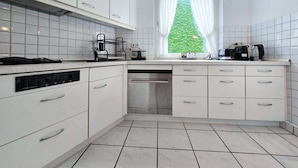 Unclassified image, 3 of 12, button - Alpha Apartments: Central 2BR, Living Room & Bath (Essen)