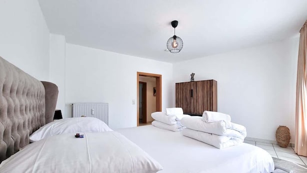 Unclassified image, 1 of 12, button - Alpha Apartments: Central 2BR, Living Room & Bath (Essen)