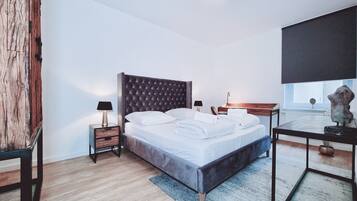 1 bedroom, desk, bed sheets