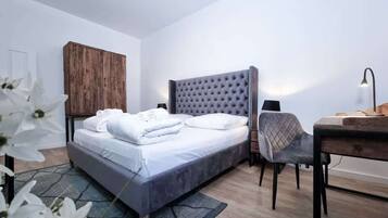 1 bedroom, desk, iron/ironing board, bed sheets