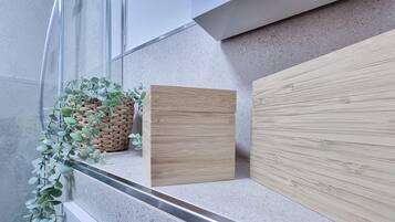 Shower, hair dryer, towels, toilet paper