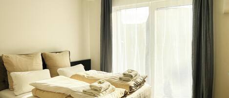 1 غرفة نوم ومكواة/لوح كي وواي فاي وملاءات أسرّة