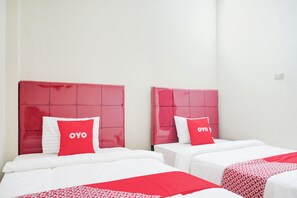 Habitación estándar con 2 camas individuales | Ropa de cama