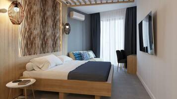 Habitación Deluxe con 1 cama doble o 2 individuales, balcón, vistas a la ciudad | Caja fuerte, cortinas opacas, sistema de insonorización