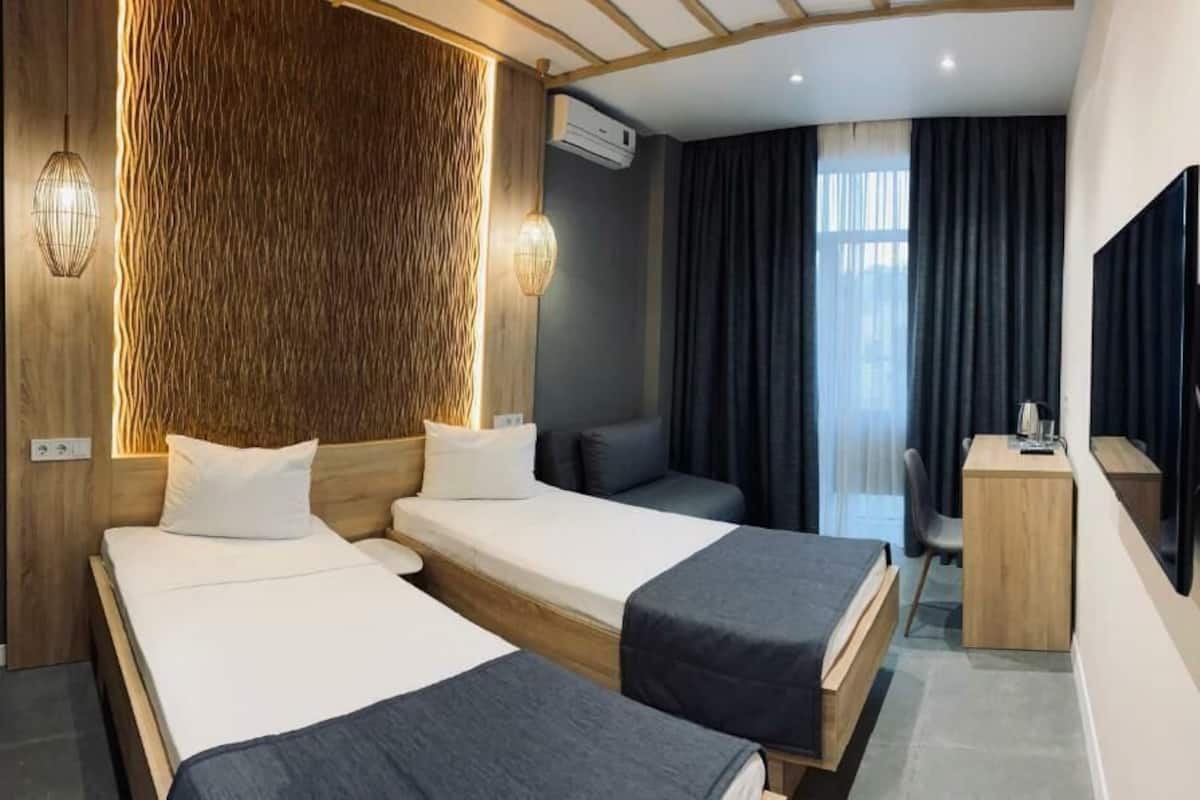 Chambre Supérieure Double ou avec lits jumeaux, balcon, vue ville