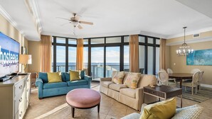 Signature Condo, 3 Bedrooms, Beach View, Beachfront | Living room | 55-inch Smart TV with digital channels - The Oasis at Orange Beach 1102 (Orange Beach)