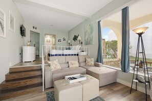 Standard Studio, Balcony, Harbour View | Living area | 40-inch TV with cable channels